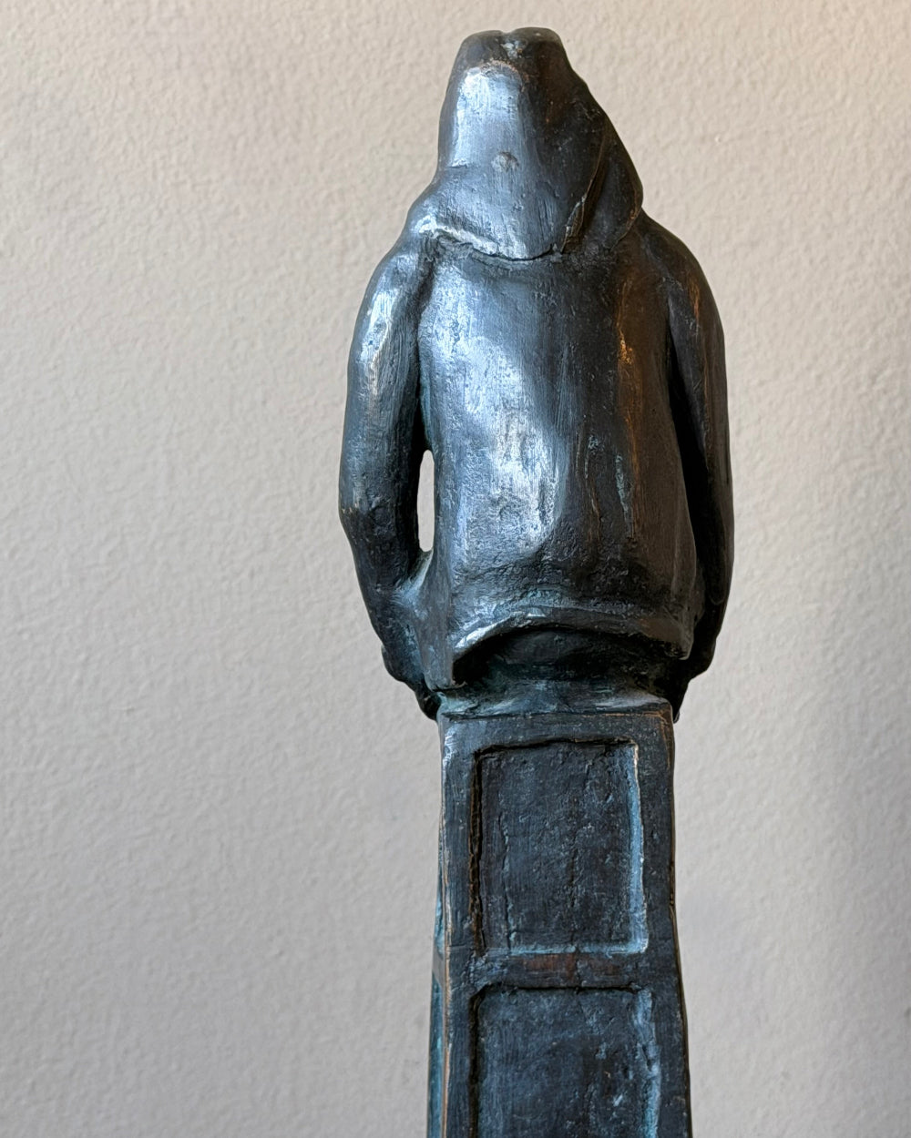 Cast Bronze of Seated Man