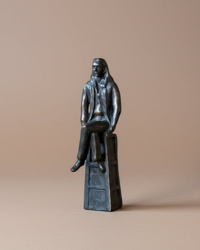 Cast Bronze of Seated Man