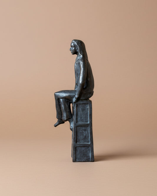 Cast Bronze of Seated Man