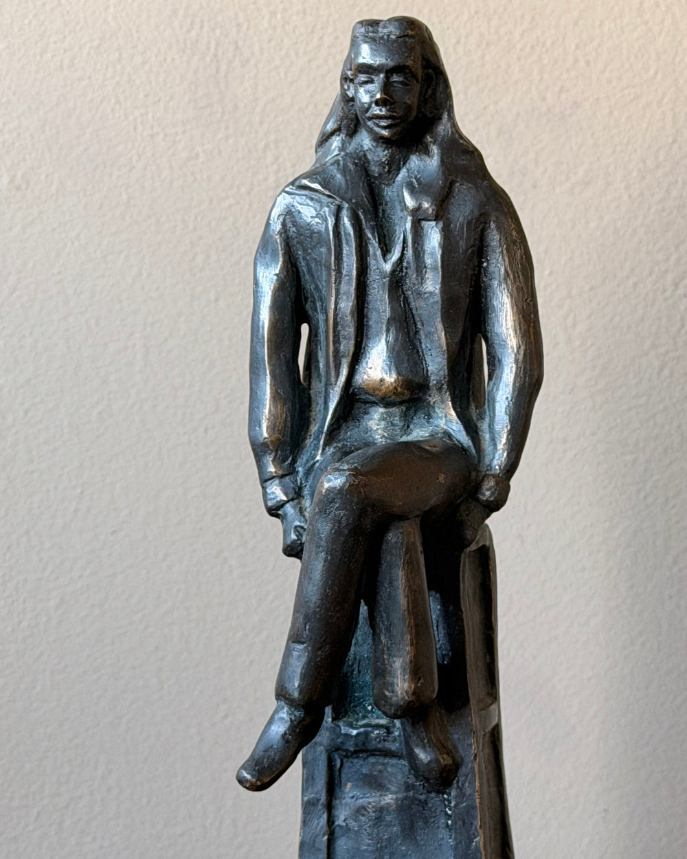 Cast Bronze of Seated Man